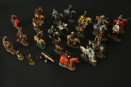 A collection of approximately twenty hand painted die cast metal soldiers, including various knights