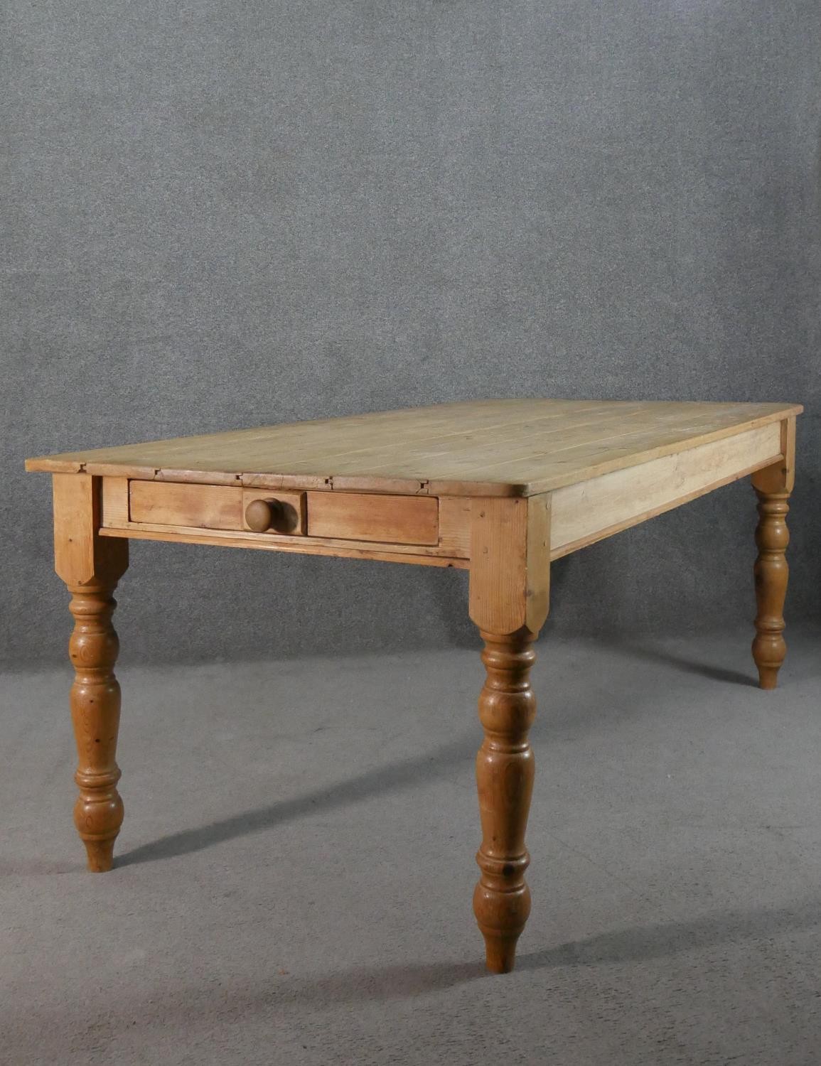 A Victorian pine planked top kitchen table, with an end drawer, on turned legs. H.75 W.186 D.97cm - Image 6 of 6