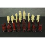 A resin chess set of 'Chinese Immortals' design, with various gods and deities. H.22cm. (largest)