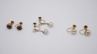 Three pairs of 9ct gold antique earrings, including a pair of 9ct rose gold paste set cluster