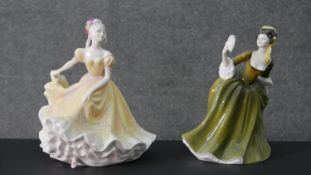 Two Doulton & Co hand painted porcelain figures Simone and Ninette. Maker's mark to the base. H.20