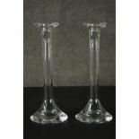 A pair of blown glass candlesticks with conical bases. H.30cm.