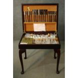 An as new Arthur Price canteen of silver plated Country Plate flatware, mahogany cased with a tan