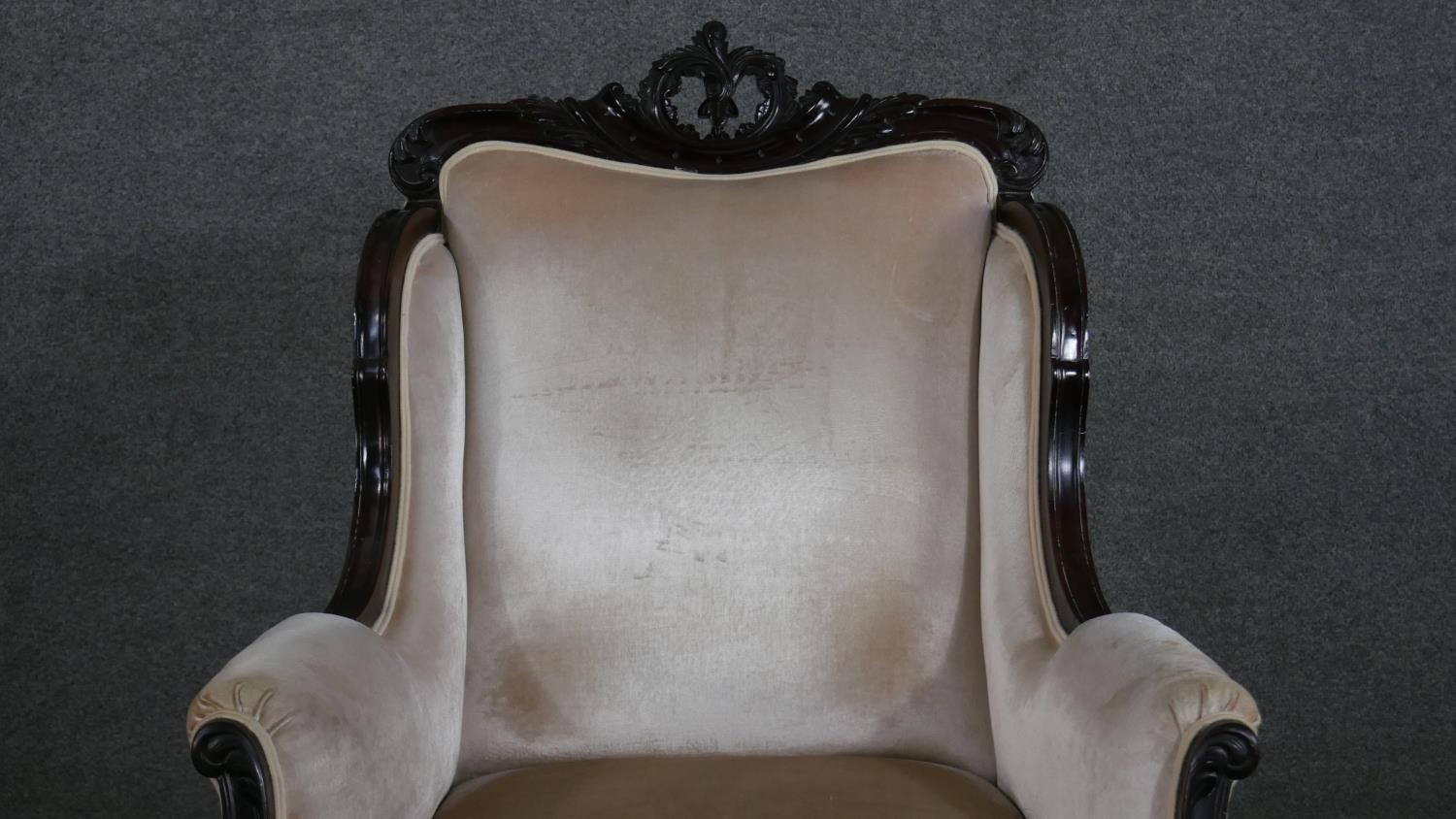 A circa 1900 mahogany armchair, with a carved crest, the scrolling arms, back and seat upholstered - Image 3 of 7