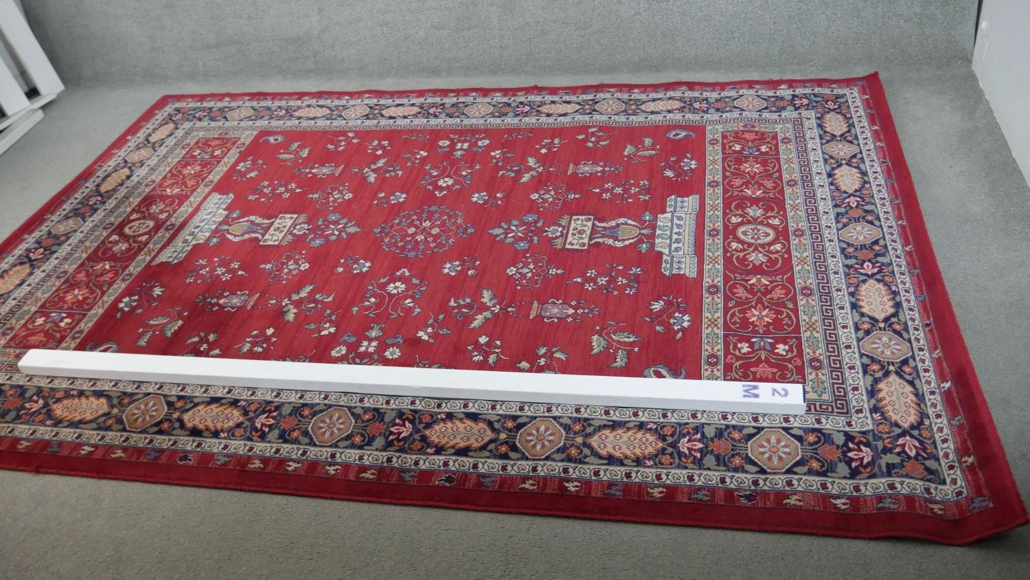 A woollen Keshan motif carpet, on a red ground. L.290 W.200cm. - Image 6 of 7