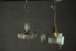 Two chandeliers, one of circular form with a small tier of lustres over a larger tier of lustres