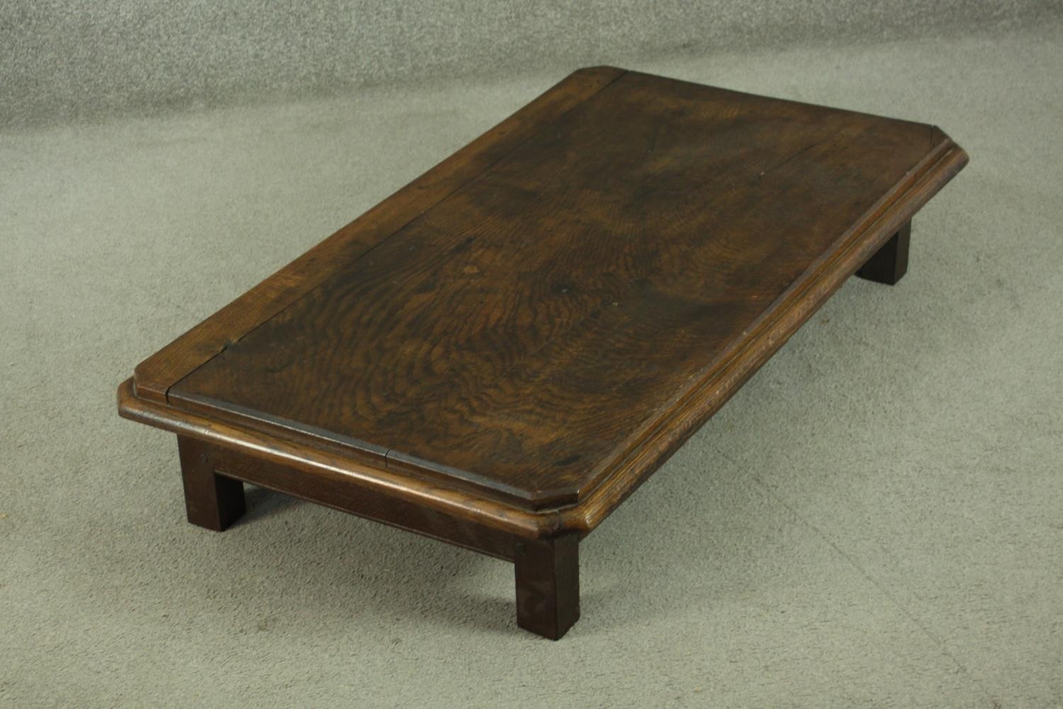An elm low coffee table, of rectangular form with canted corners and a moulded edge, on square - Image 5 of 8