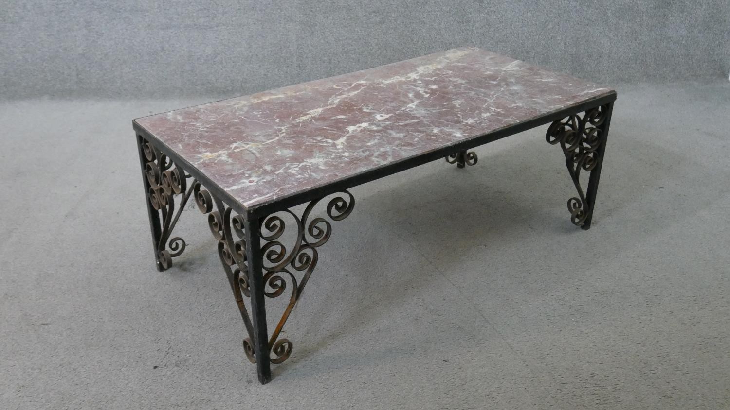 A vintage rectangular rouge marble topped coffee table, on an iron frame with scrolling wrought iron - Image 5 of 5