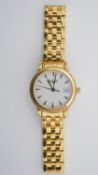 A ladies 18ct yellow gold Longines quartz watch with Longines articulated bracelet. White enamel