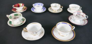 A collection of eight decorative Bavarian porcelain and fine china tea cups, each with different