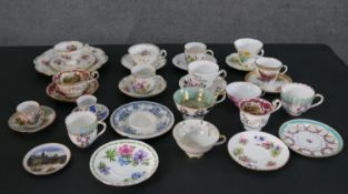 A large collection of 19th and 20th century cups and saucers, including Royal Windsor, Hammersley