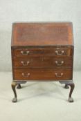An 18th century style Edwardian mahogany bureau, the fall front revealing drawers, pigeonholes and a