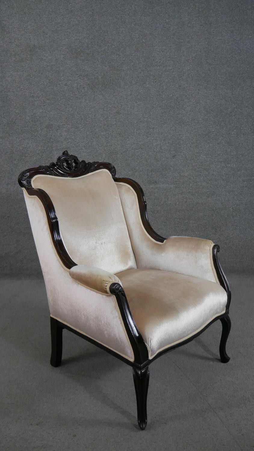 A circa 1900 mahogany armchair, with a carved crest, the scrolling arms, back and seat upholstered - Image 2 of 7