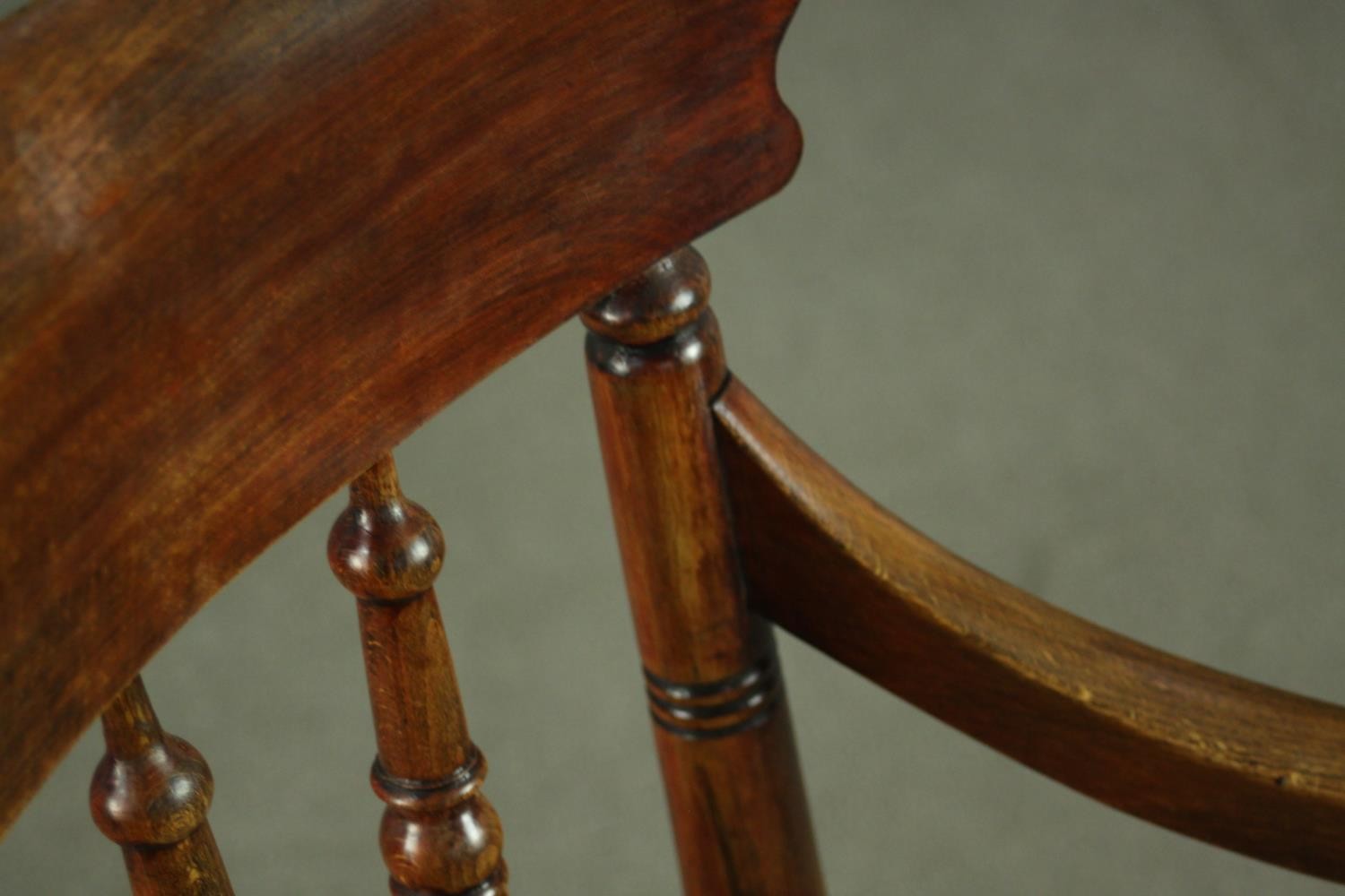 A rustic stained beech bar back open armchair, with turned spindles over a tapestry style seat, on - Image 7 of 7