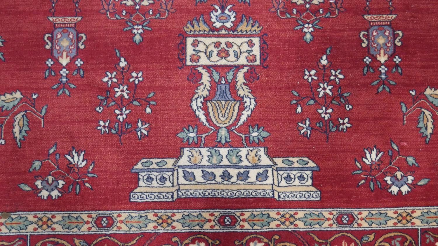 A woollen Keshan motif carpet, on a red ground. L.290 W.200cm. - Image 4 of 7