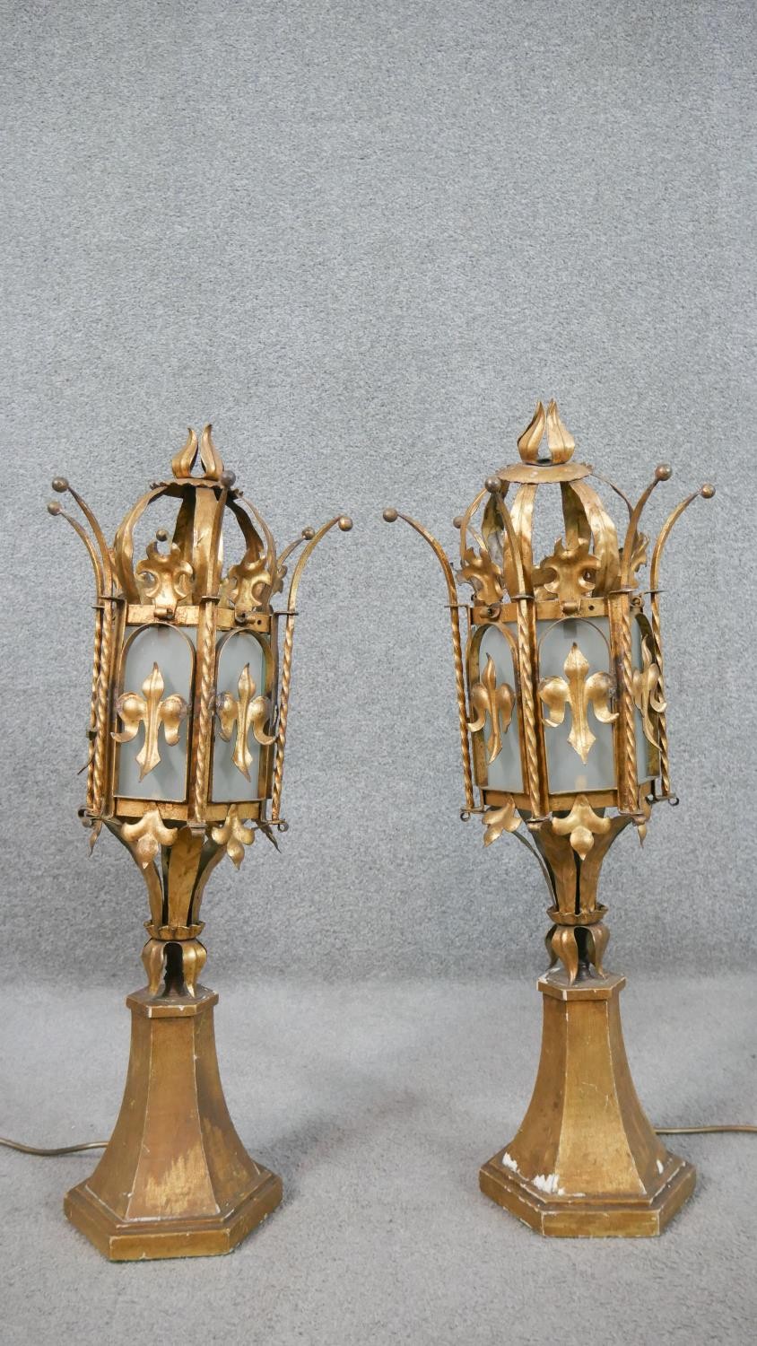 A pair of gilt metal lamps, believed to be Venetian gondola lanterns, of hexagonal section with
