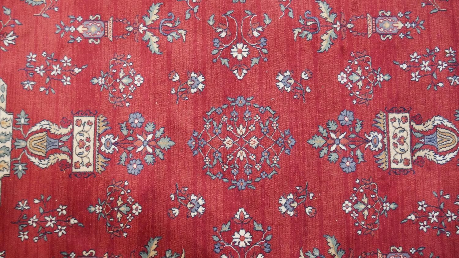 A woollen Keshan motif carpet, on a red ground. L.290 W.200cm. - Image 3 of 7