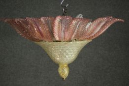A Venetian hand blown glass ceiling light, with pink glass leaves over a bowl shaped body and