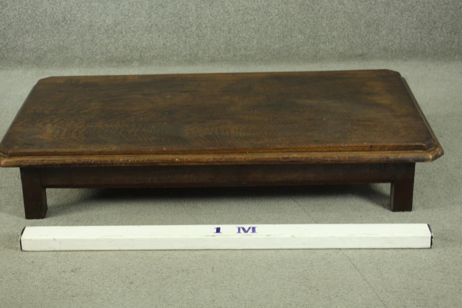 An elm low coffee table, of rectangular form with canted corners and a moulded edge, on square - Image 4 of 8