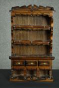 A 20th century miniature stained beech dresser, possibly an apprentice piece, complete with a