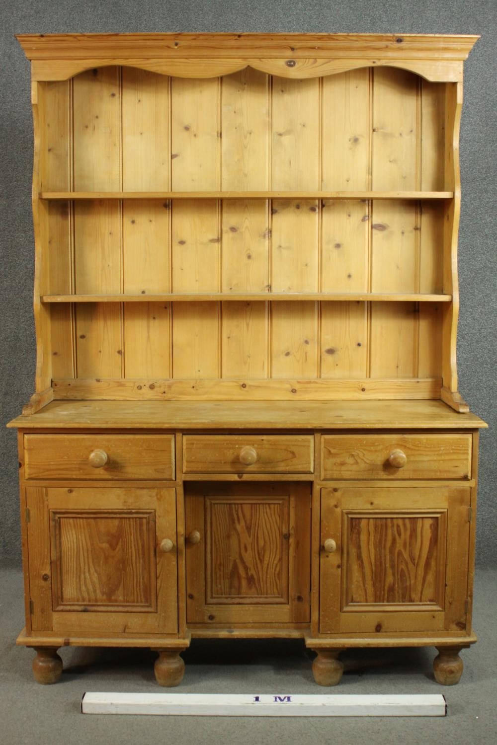 A Victorian style pine kneehole dresser with open plate rack above three short drawers over three - Image 2 of 8