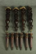 Two sets of furniture legs, including a set of four early Victorian mahogany turned and carved legs,
