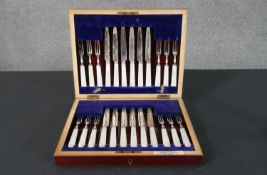 A canteen of late 19th century silver plated and mother of pearl handled fruit knives and forks