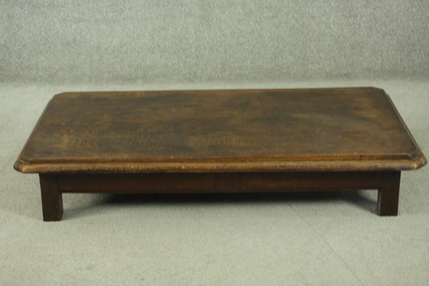An elm low coffee table, of rectangular form with canted corners and a moulded edge, on square - Image 2 of 8