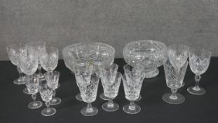 A large collection of cut crystal, including a set of six sherry glasses, four wine glasses and