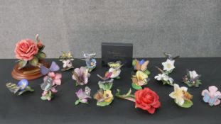 A collection of fifteen Franklin Mint 'Butterflies of the World' hand painted porcelain figures with