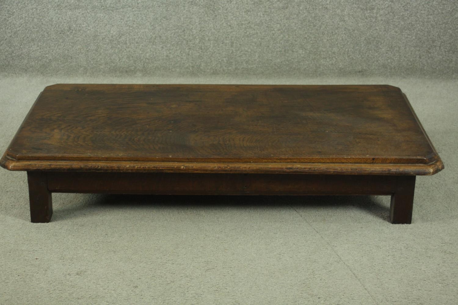 An elm low coffee table, of rectangular form with canted corners and a moulded edge, on square - Image 3 of 8
