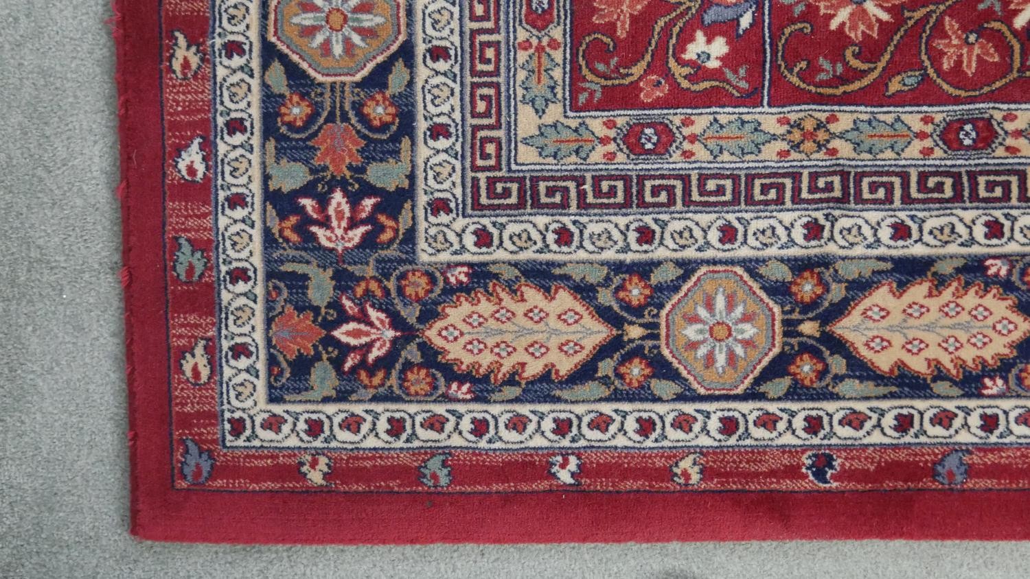 A woollen Keshan motif carpet, on a red ground. L.290 W.200cm. - Image 7 of 7