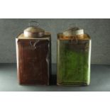 Two painted steel ship's lanterns, one green and one red with carrying handles. H.45 W.24 D.24cm.