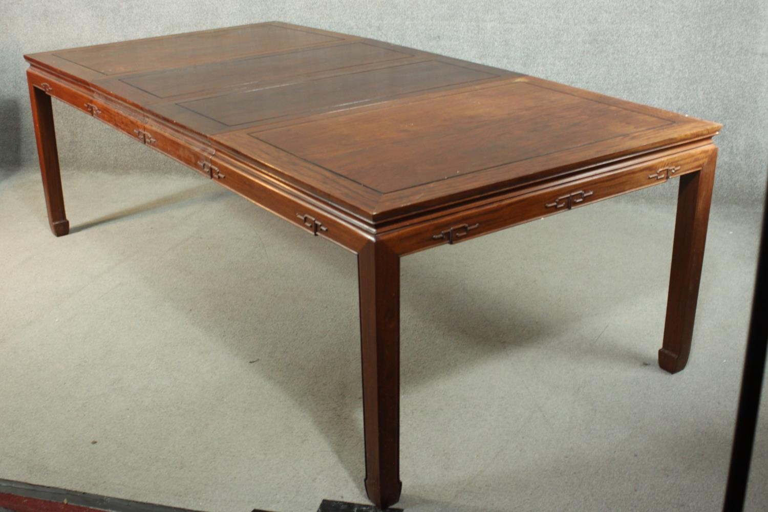 A late 20th century Chinese rosewood dining table, with a rectangular top and two additional leaves, - Image 7 of 14