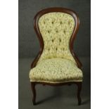 A contemporary late 19th century style stained beech spoon back chair, upholstered in light yellow