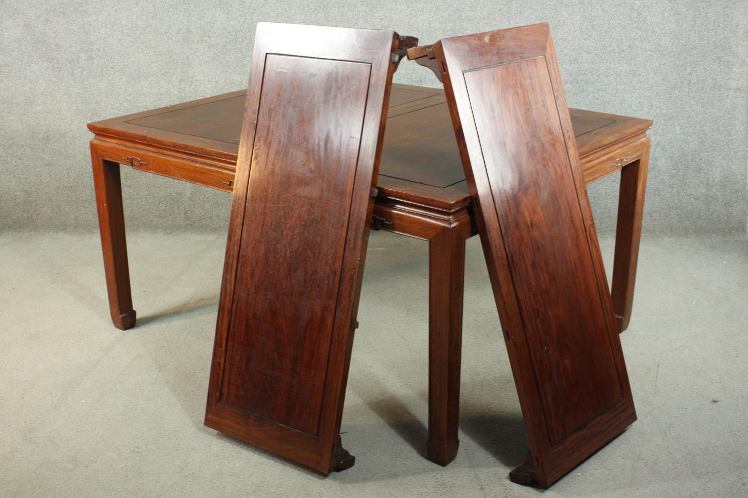 A late 20th century Chinese rosewood dining table, with a rectangular top and two additional leaves, - Image 14 of 14