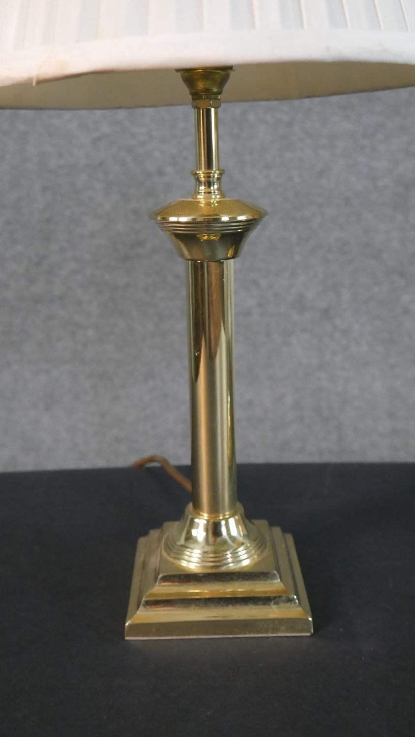 A collection of five brass table lamps, one of Corinthian column form, a pair of chamber sticks, and - Image 4 of 6