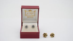 A pair of diamond and sapphire floral design yellow and white metal earrings along with a pair of