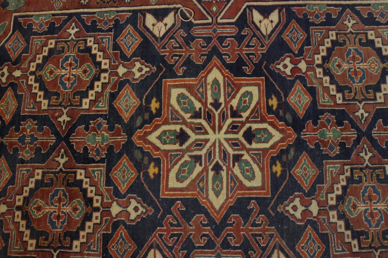 A hand made blue ground Chechen carpet. L.266 W.220cm. - Image 3 of 6