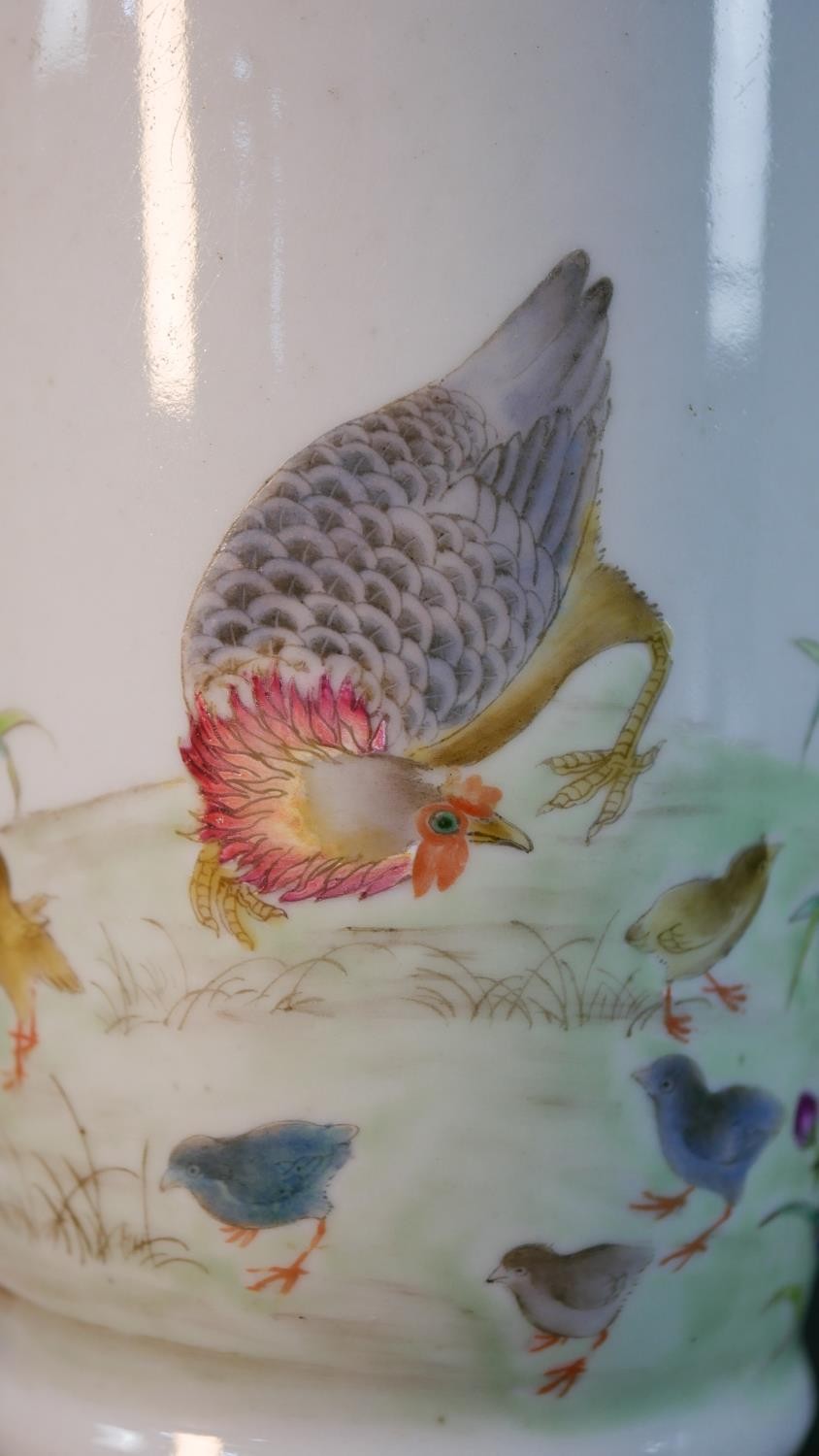 A Chinese porcelain hand painted vase decorated with a rooster, hen and chicks under a blossom tree. - Image 7 of 11