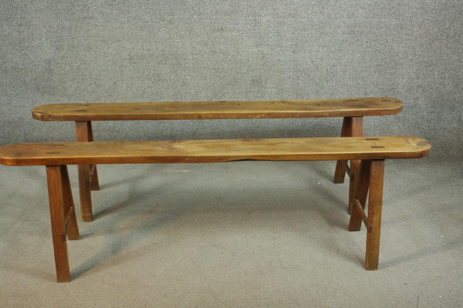 A pair of 19th century French provincial oak benches, the plank tops with rounded ends, on splayed - Image 6 of 8