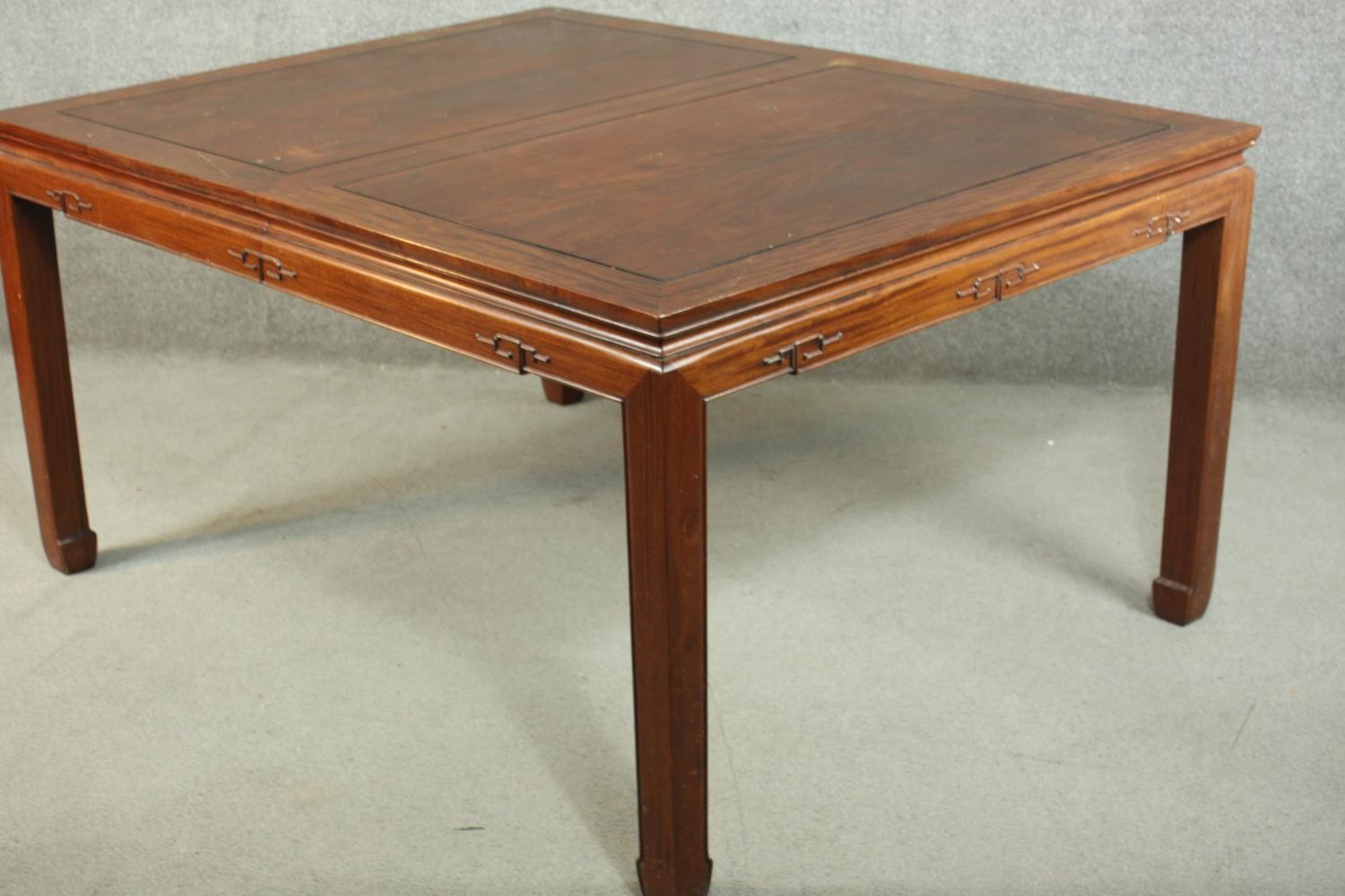 A late 20th century Chinese rosewood dining table, with a rectangular top and two additional leaves, - Image 10 of 14
