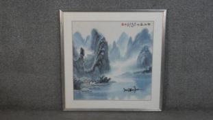 A framed and glazed ink on paper of a Japanese mountainous landscape, with artists seal. H.86 W.86cm