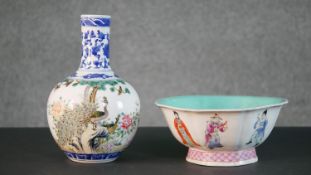 Two hand painted porcelain Chinese pieces, one bottle shaped vase decorated with peacocks among