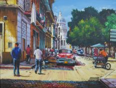 A framed oil on canvas of a Havana Old Town, unsigned. H.67 W.86cm