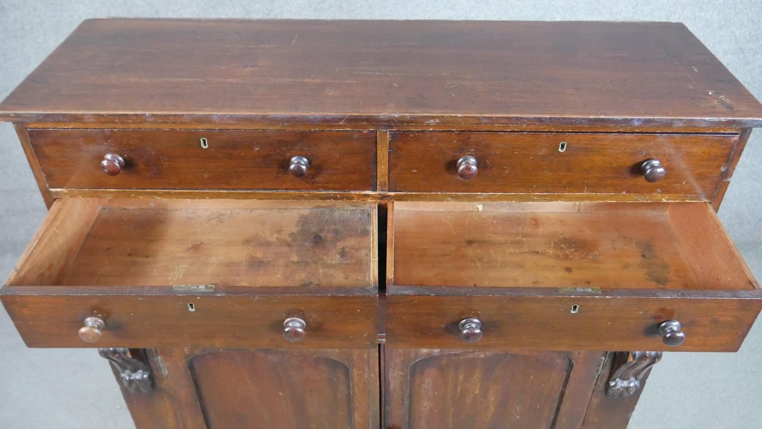 A Victorian mahogany chiffonier, surmounted by a section with two pairs of short drawers, over a - Image 4 of 6