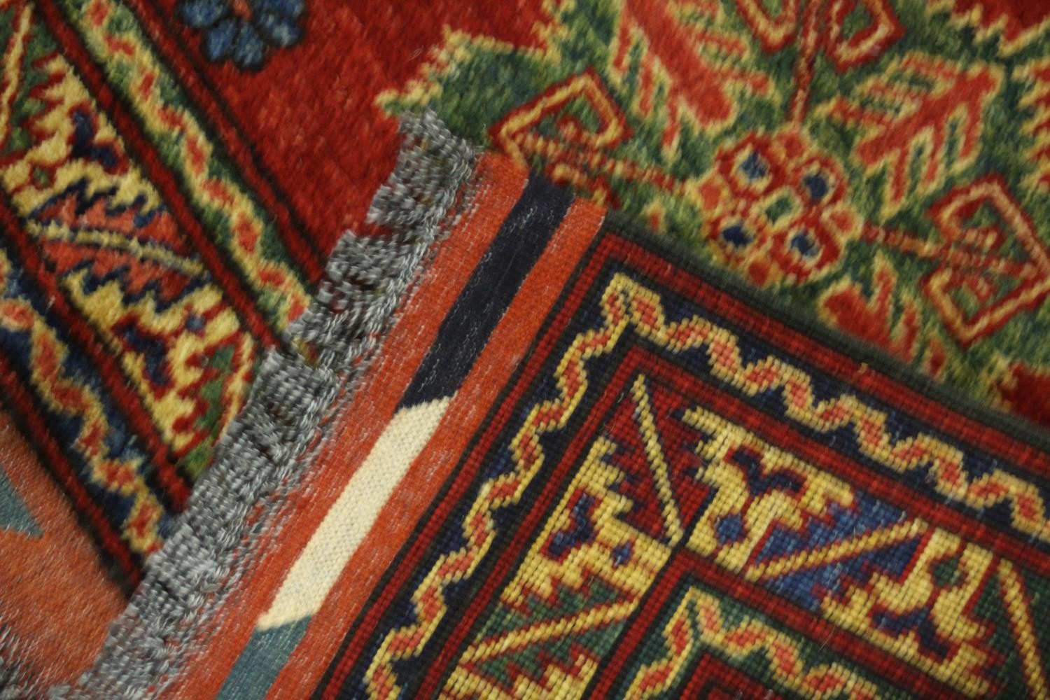 A hand made red ground Chechen rug. L.105 W.78cm. - Image 5 of 5