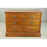 A circa 1900 walnut chest, the rectangular top with a moulded edge over two short and two long