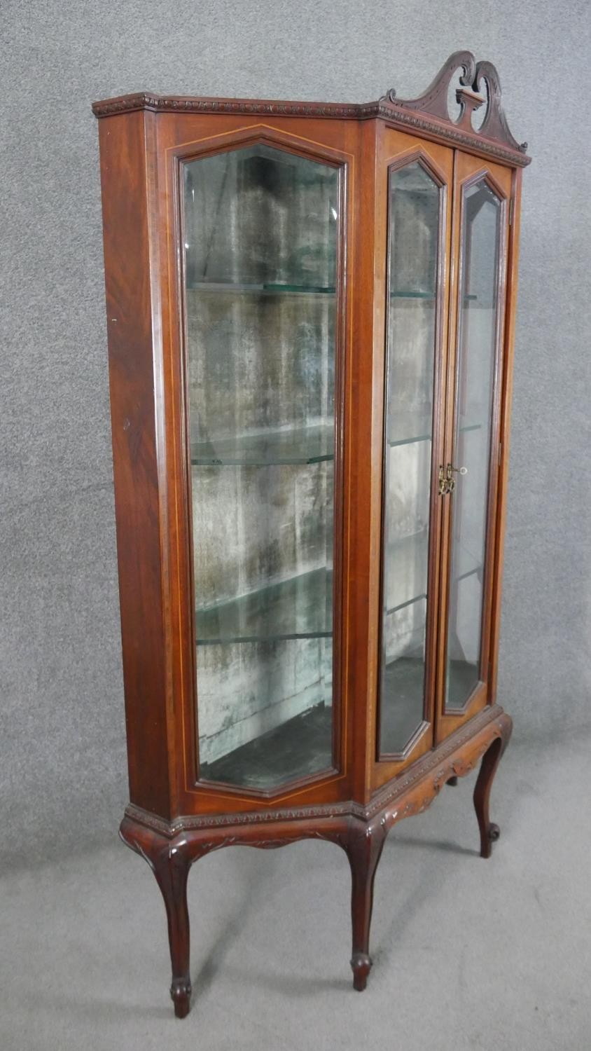 An Edwardian mahogany display cabinet, with a swan neck pediment, over a pair of bevelled glass - Image 8 of 8