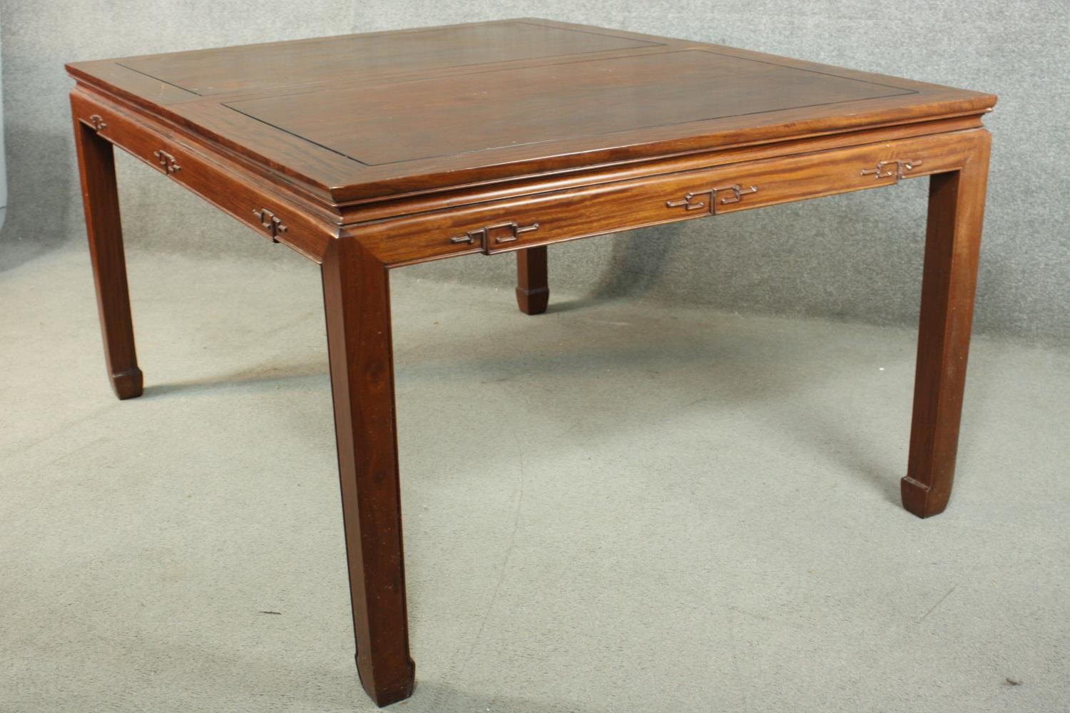 A late 20th century Chinese rosewood dining table, with a rectangular top and two additional leaves, - Image 11 of 14